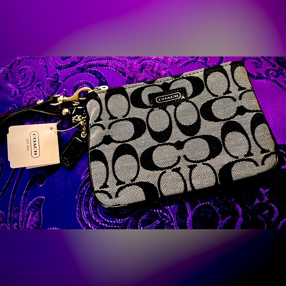 Coach Signature Black and Cream Wristlet with hang tag. Retails $149 NEW